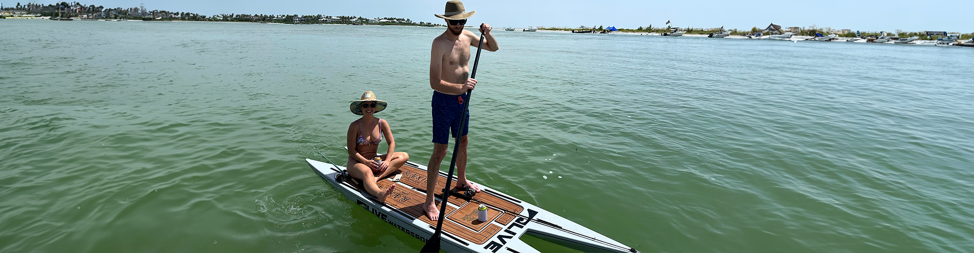 Person on a paddleboard for rentals in Charlotte Harbor